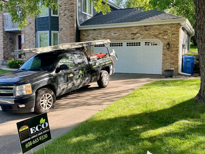 Eco Garage Door Services company truck stocked for a garage door inspection near Austin, TX